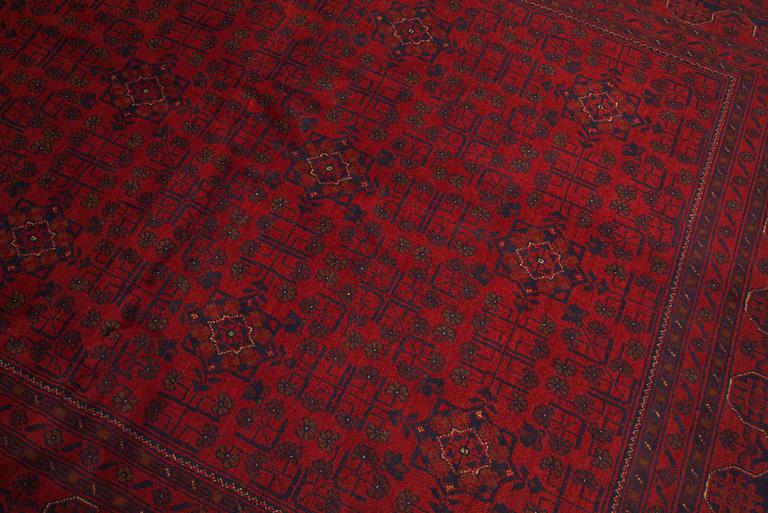 A Afghan carpet, 232 x 167 cm.