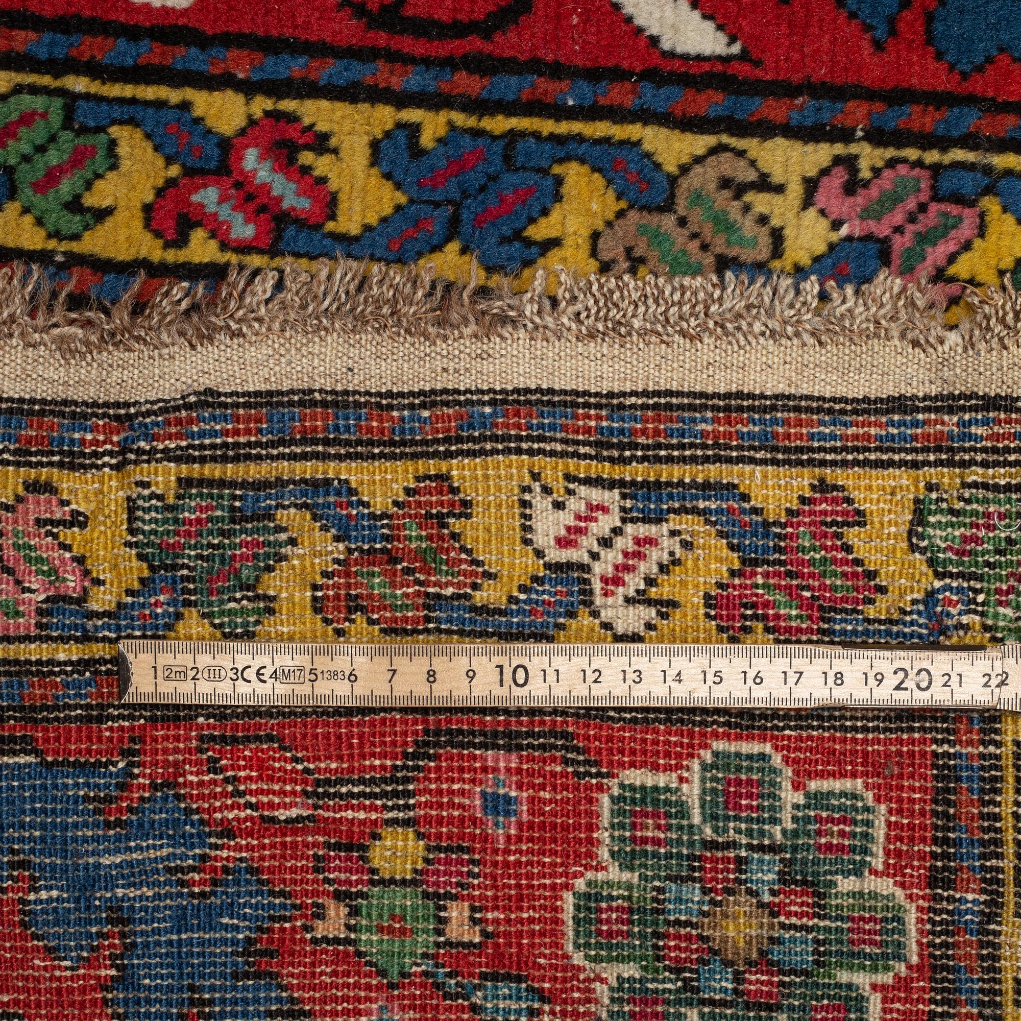 A RUNNER, semi-antique Karabagh, ca 500 x 106 cm.