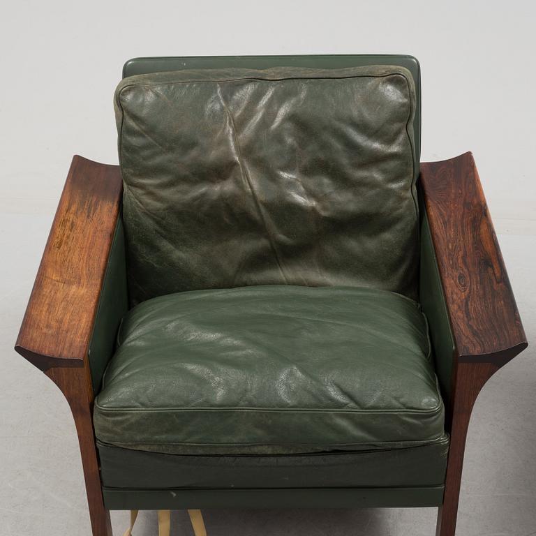A 1960's Danish sofa, with 2 easy chairs and 2 tables by Glostrup.
