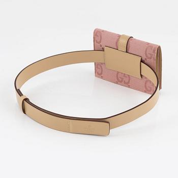 Gucci, a belt with a bag.