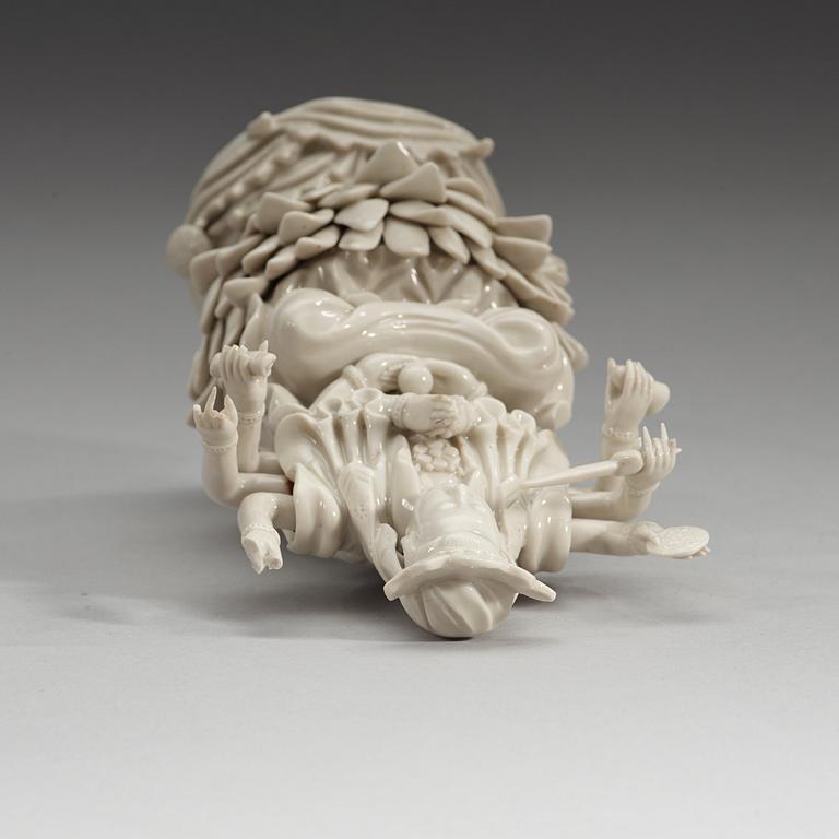 An eigth armed blanc de chine figure of a Bodhisattva, Qing dynasty, 19th Century.