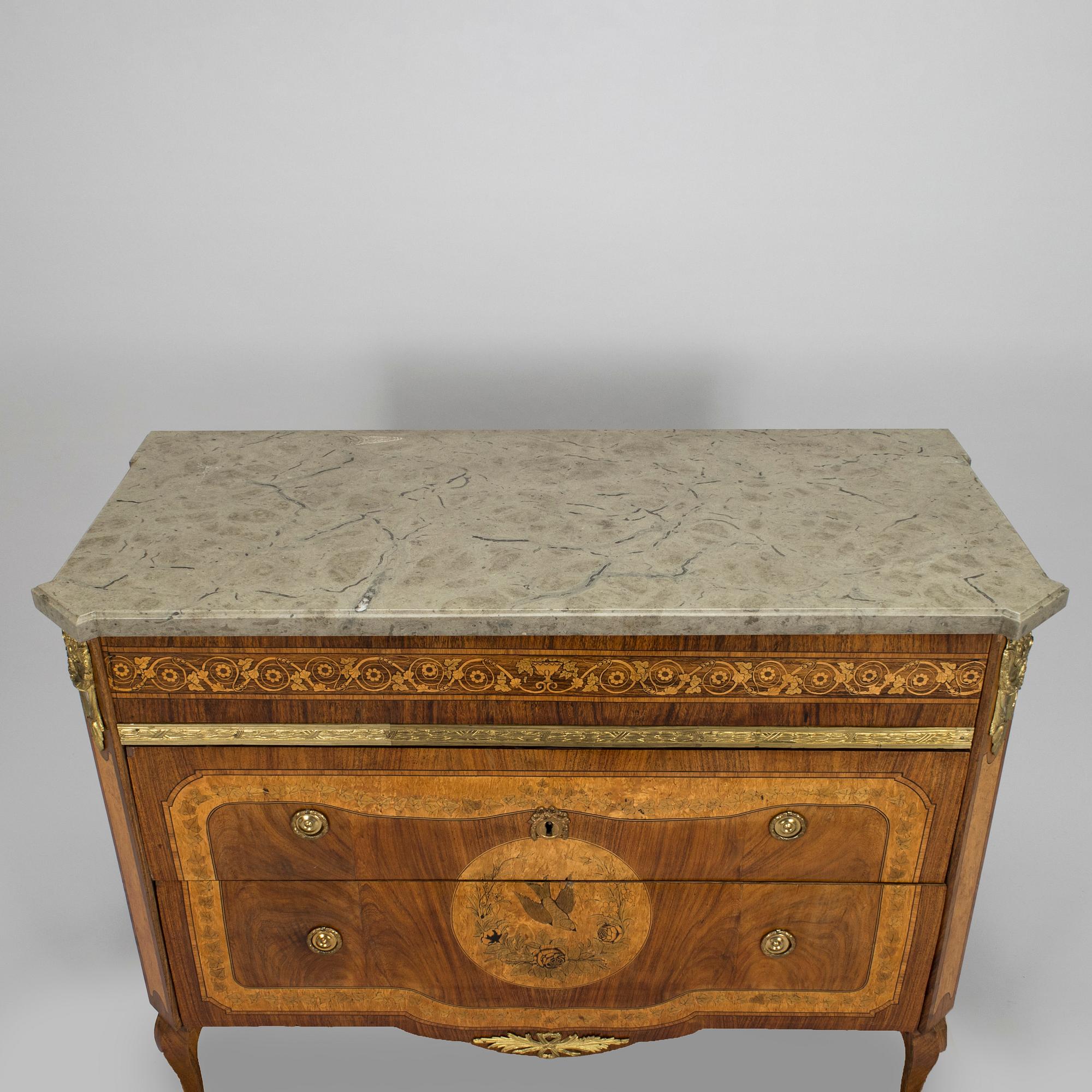 A Louis XVI style chest of drawers, second half of the 19th century.