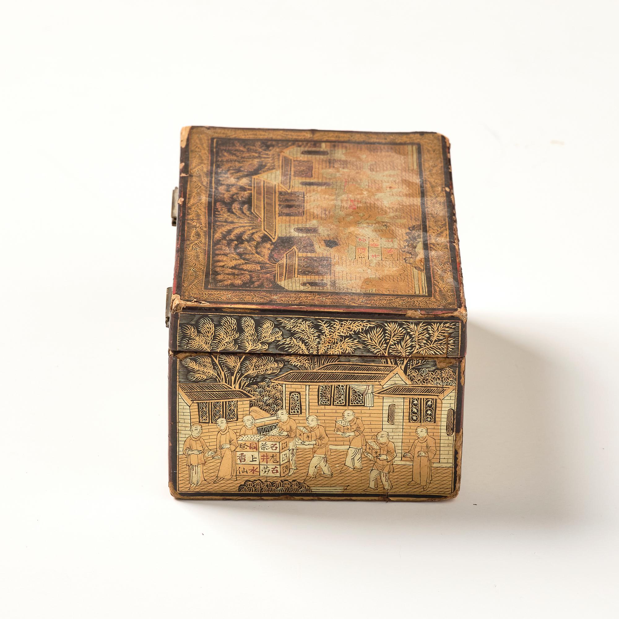 A lacquer tea box and a blanc de chine cup, Qing dynasty 18/19th century.