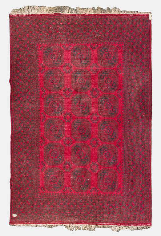 Two Afghan carpets. Ca. 326 x 217 and 88 x 63 cm.