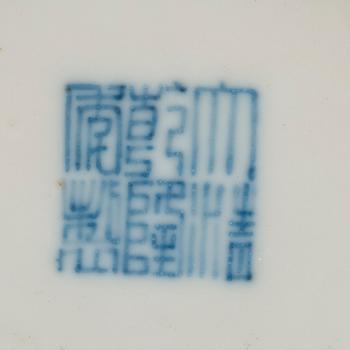 A turqoise ground and pink sgrafitto dish, Qing dynasty with Qianlong mark.