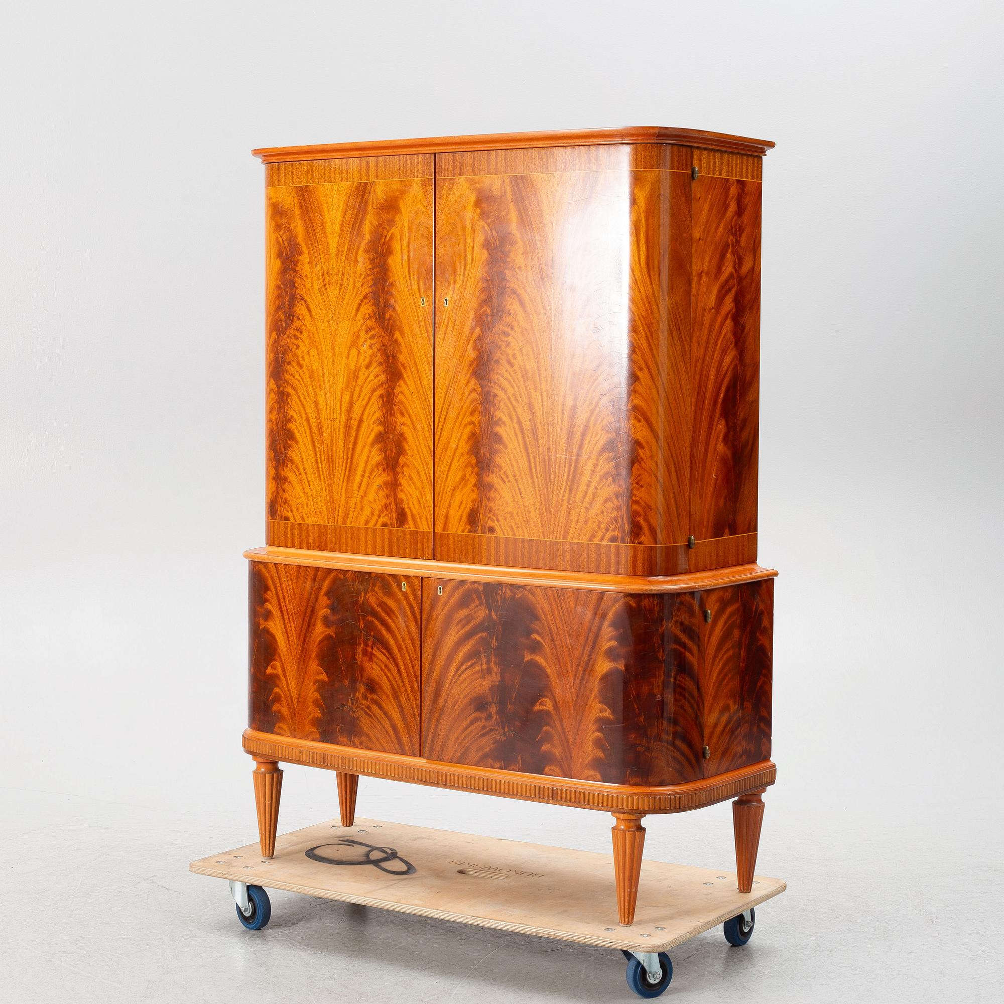 A Swedish Modern cabinet, mid 20th Century.