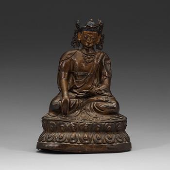 296. A copper alloy and gilt repoussé Bodhisattva, 17th/18th century.