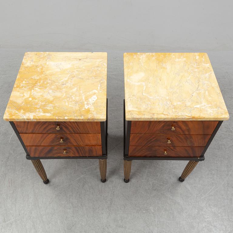 A pair of mid 20th century bedside tables.