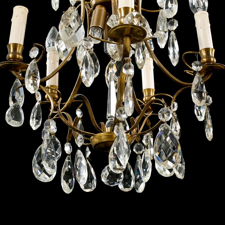 A mid 1900s chandelier, height ca 58 cm.