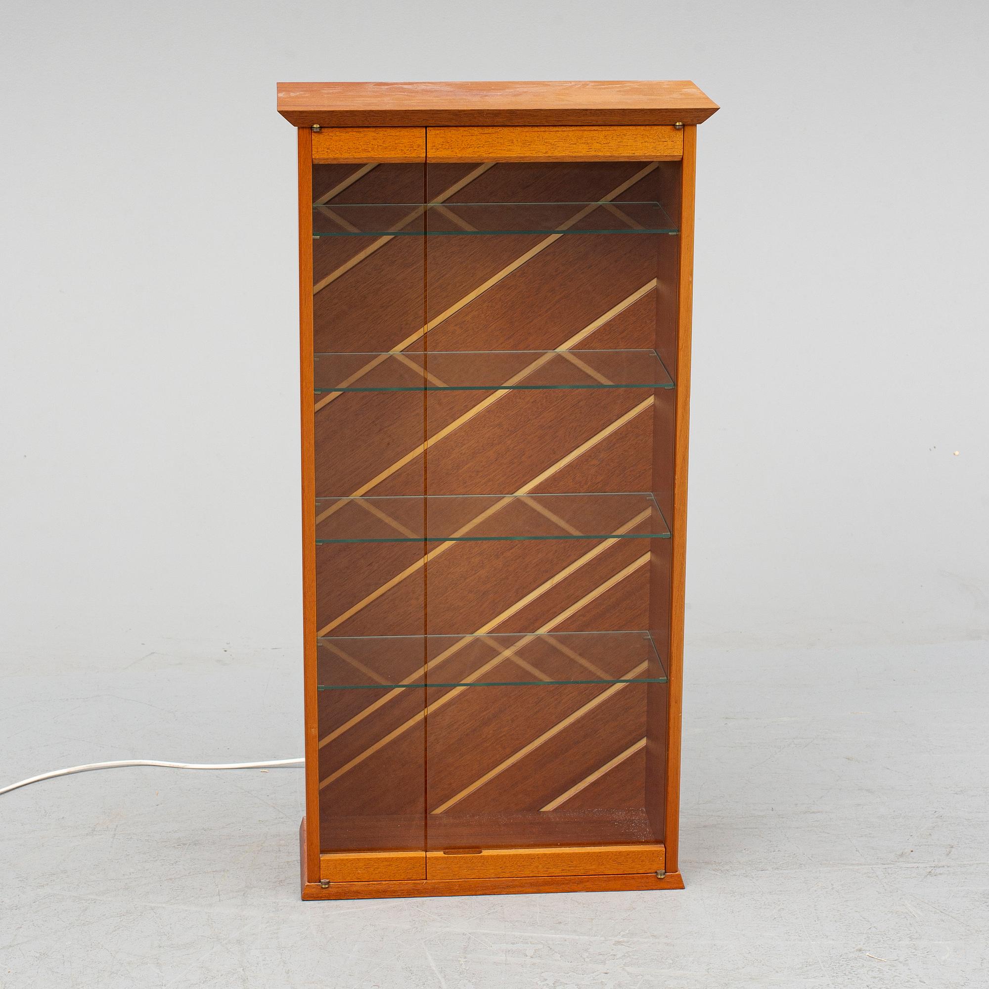 A mahogany wall cabinet, second half of the 20th Century.