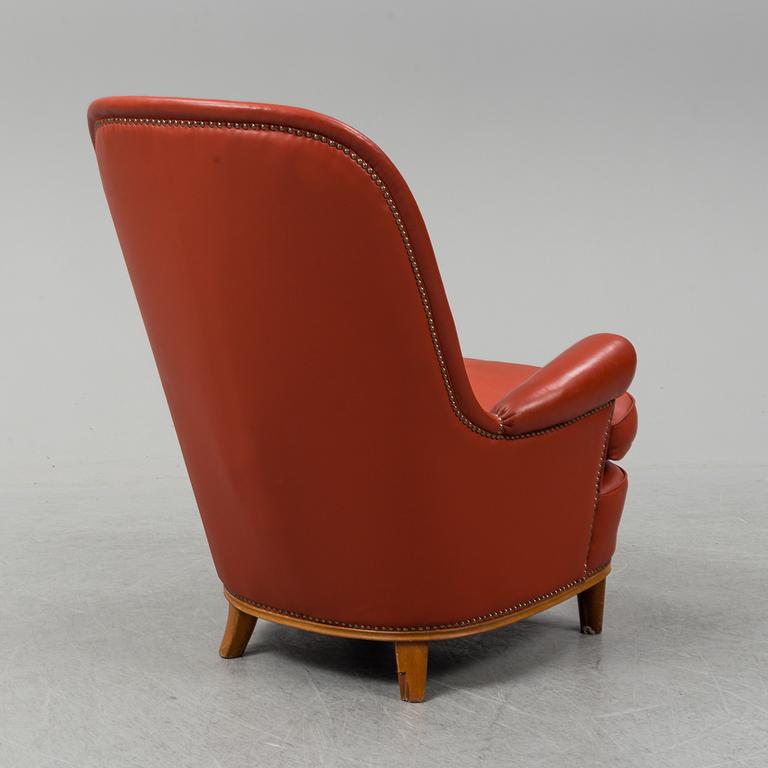 A 1930's leather upholstered 'Paris' lounge chair by Carl Axel Acking.