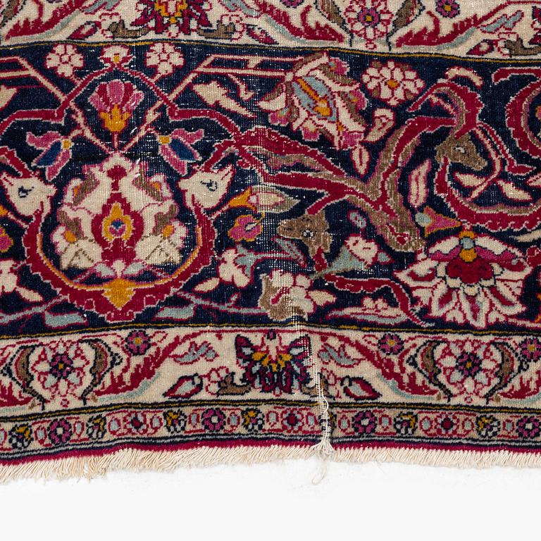 An antique Isfahan carpet, circa 342 x 250-260 cm.