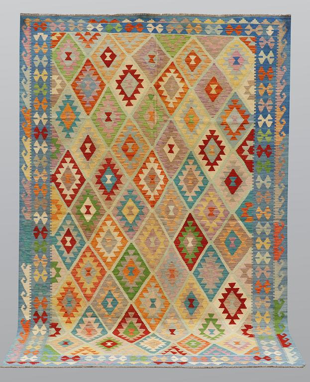 A carpet, kilim, ca 305 x 208 cm.