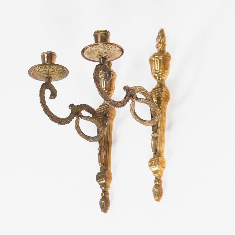 A pair of 'Törne' brass one-light wall ligths from IKEA's 18th Century collection.