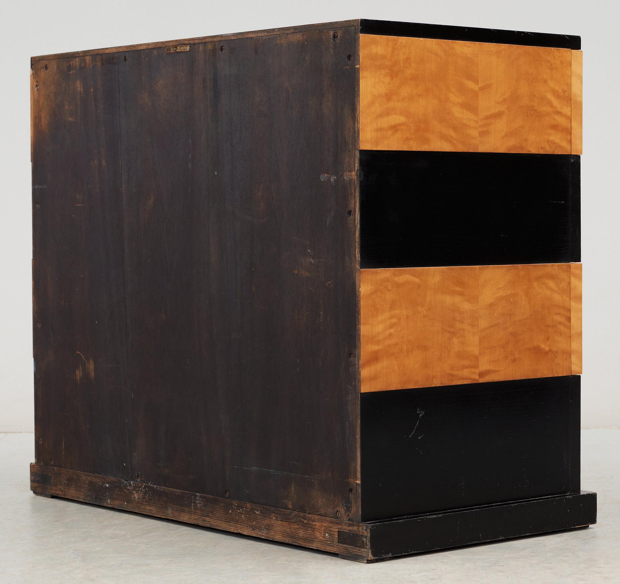 An Axel Einar Hjorth birch chest of drawers, 'Grand', Nordiska Kompaniet, NK, Stockholm 1930.