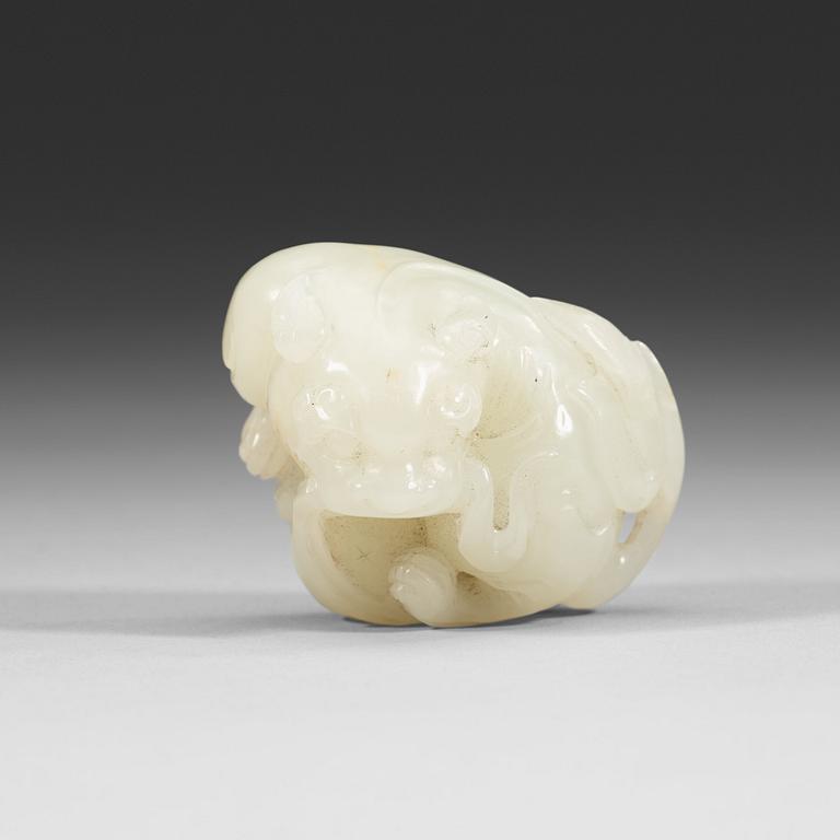A carved nephrite figurine, presumably late Qing dynasty (1644-1912).