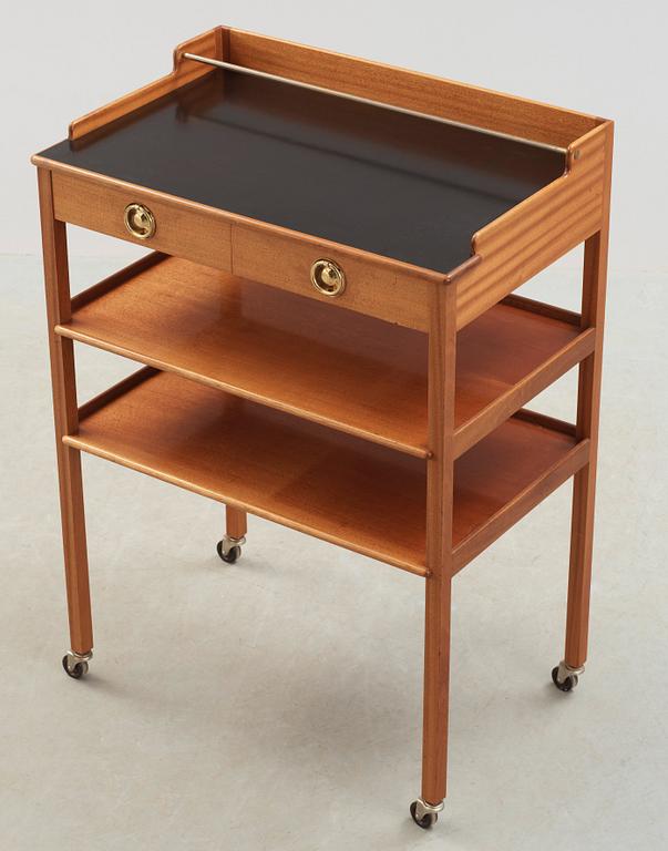 A Josef Frank mahogany serving table, Svenskt Tenn, model 2227.