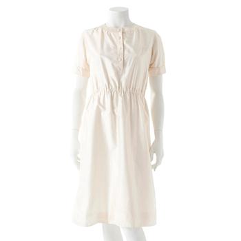 490. COURRÈGES, a creme colored silk dress.