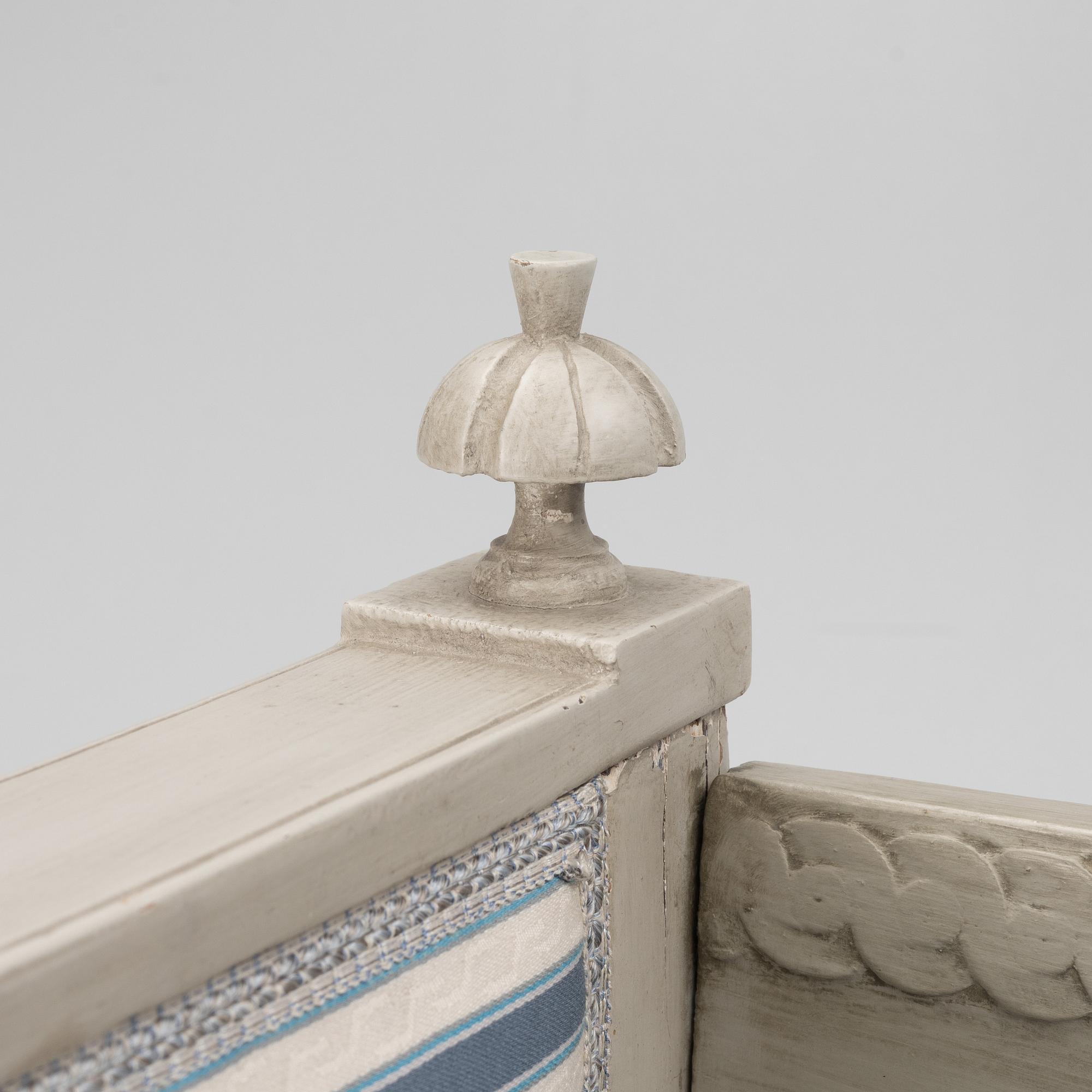 A late Gustavian sofa, 19th century.