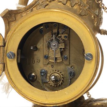 An Empire table clock, likely Northern Europe, early 19th century.