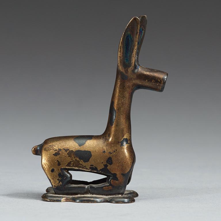 An Ordo bronze figure of a reclining deer, Warring States (481 BC-221 BC).