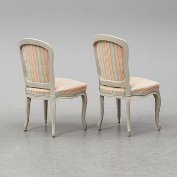 A mid 18th Century matched pair of Rococo chairs.