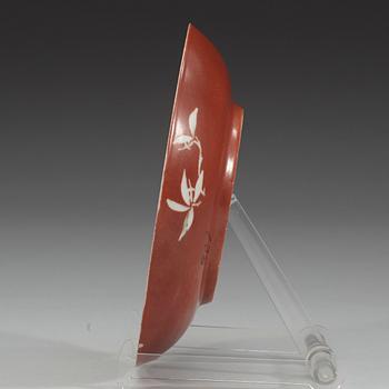 An enamelled coral-gorund dish, Qing dynasty with Daoguangs seal mark and period (1821-1850).