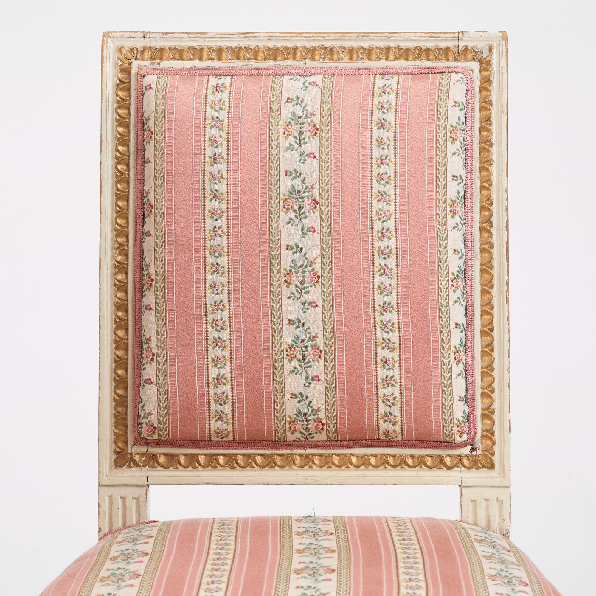 A set of four Gustavian chairs by E. Öhrmark (master in Stockholm 1777-1813).