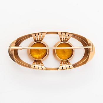 Brosch, 14K guld med citriner. Kaisaniemen Kello ja Kulta 1965.
