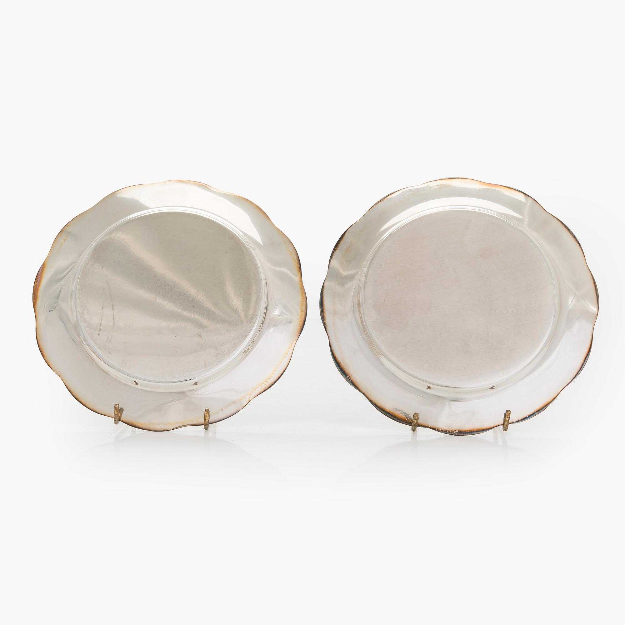 A 10-piece set of silver chargers, Kultateollisuus, Turku 1938 and 1980.