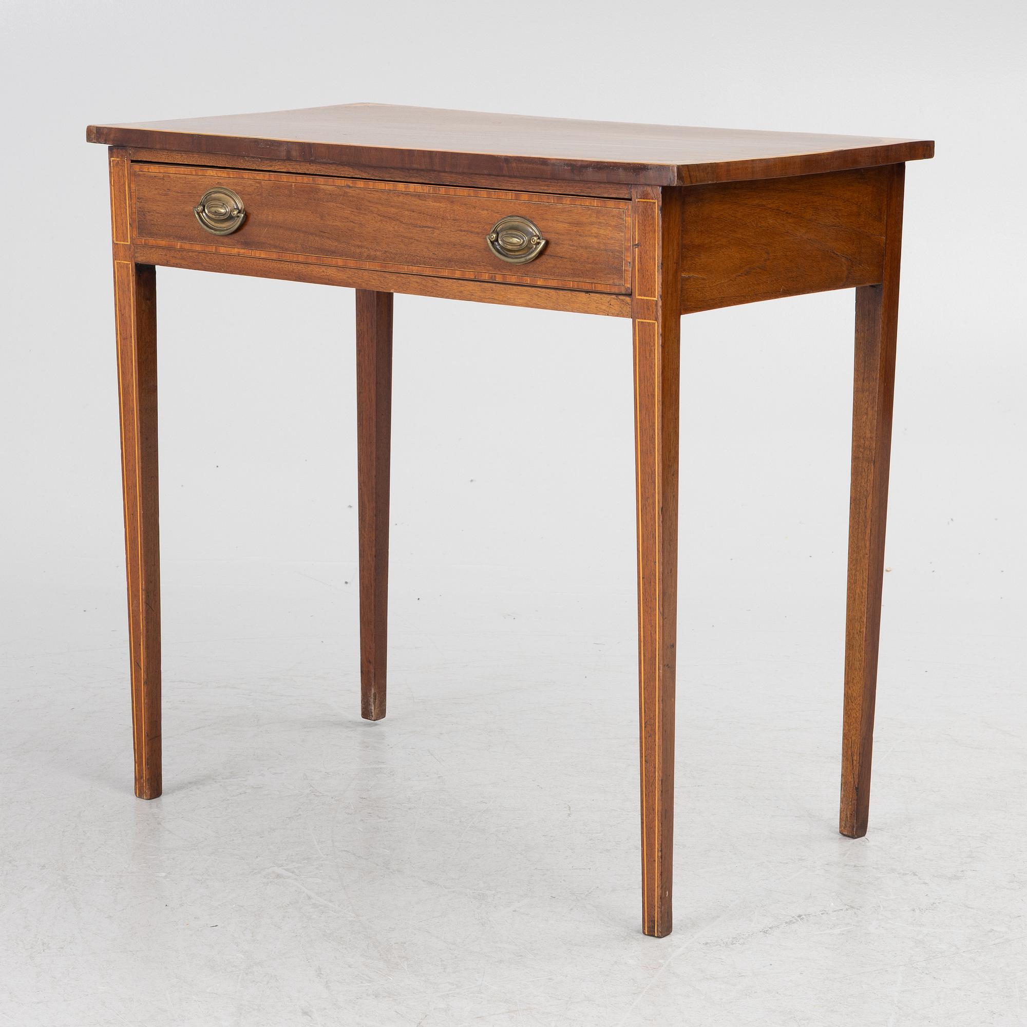 A table, England, circa 1900.