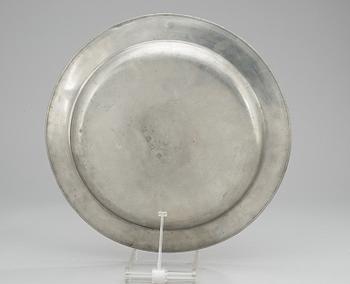 A pewter plate, makers mark by Peter Karm, Hudiksvall (1756-1758).