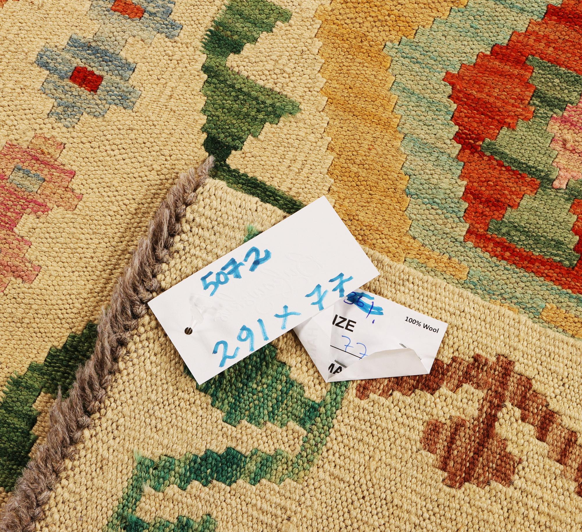 A Kilim runner carpet, c. 291 x 77 cm.