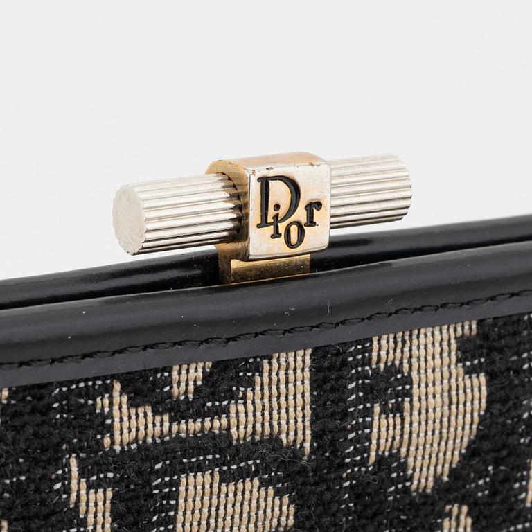 Christian Dior, a canvas clutch and wallet.