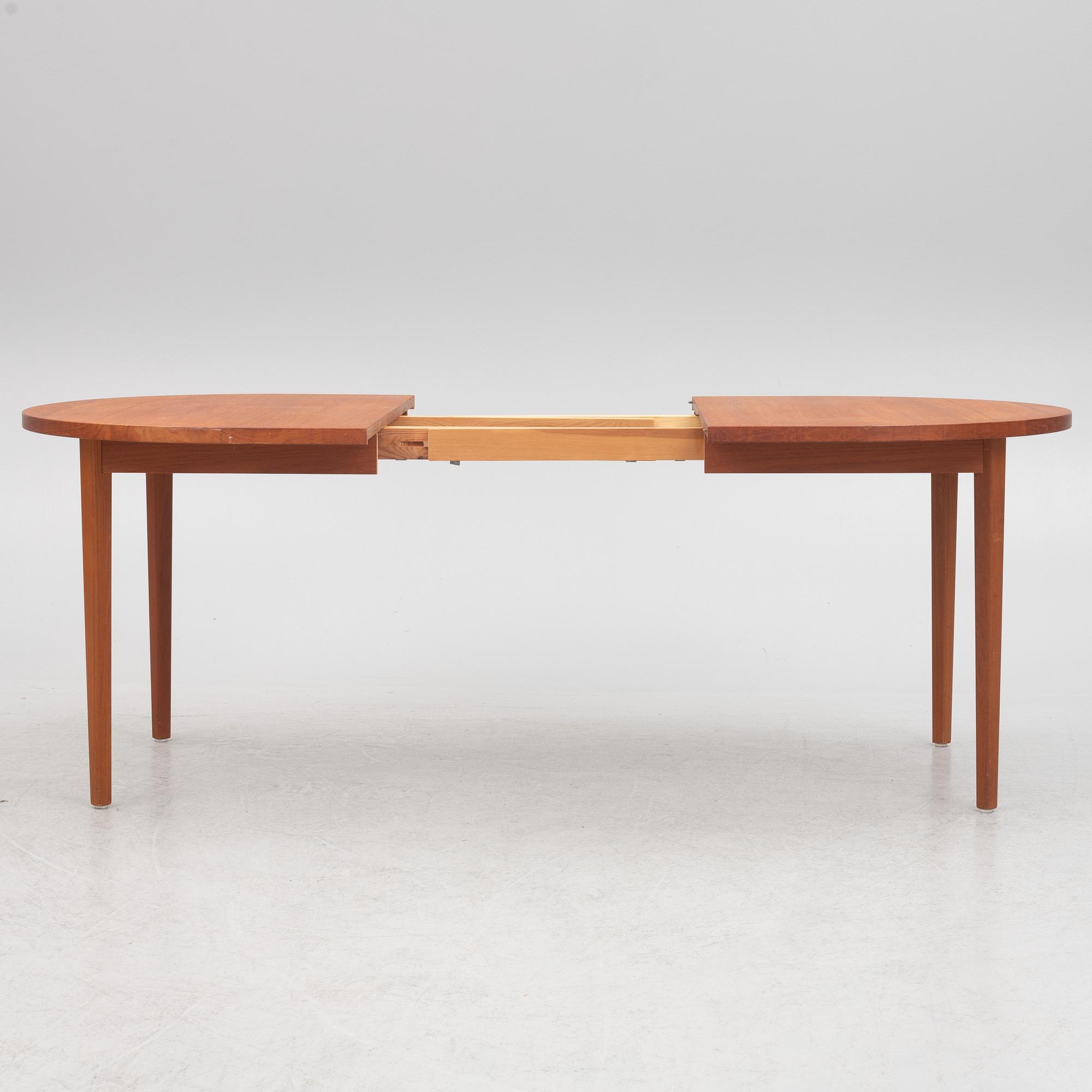 A dining table, 1960s.
