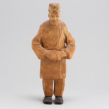 Axel Petersson Döderhultarn, sculpture. Signed. Carved and partly painted wood. Height 25.5 cm.