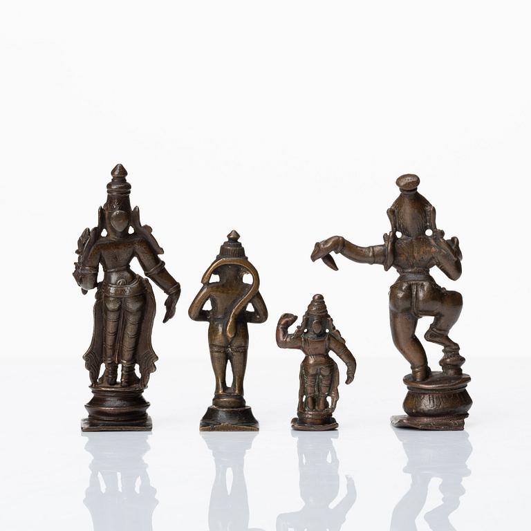 A group of four bronze miniature sculptures, India, 19th Century or older.