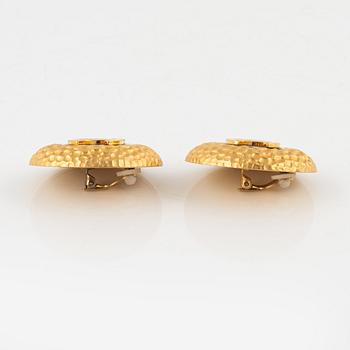 Chanel, a pair of gold tone clip-on earrings, 1990-1992.
