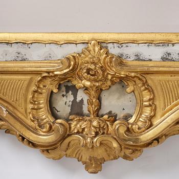 A giltwood rococo mirror, Stockholm, later part 18th century.
