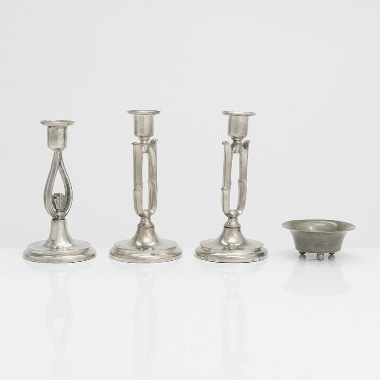 Paavo Tynell, pewter candlesticks, pair model 8025, single candlestick model 8022, and a footed bowl, Taito 1920s/30s.