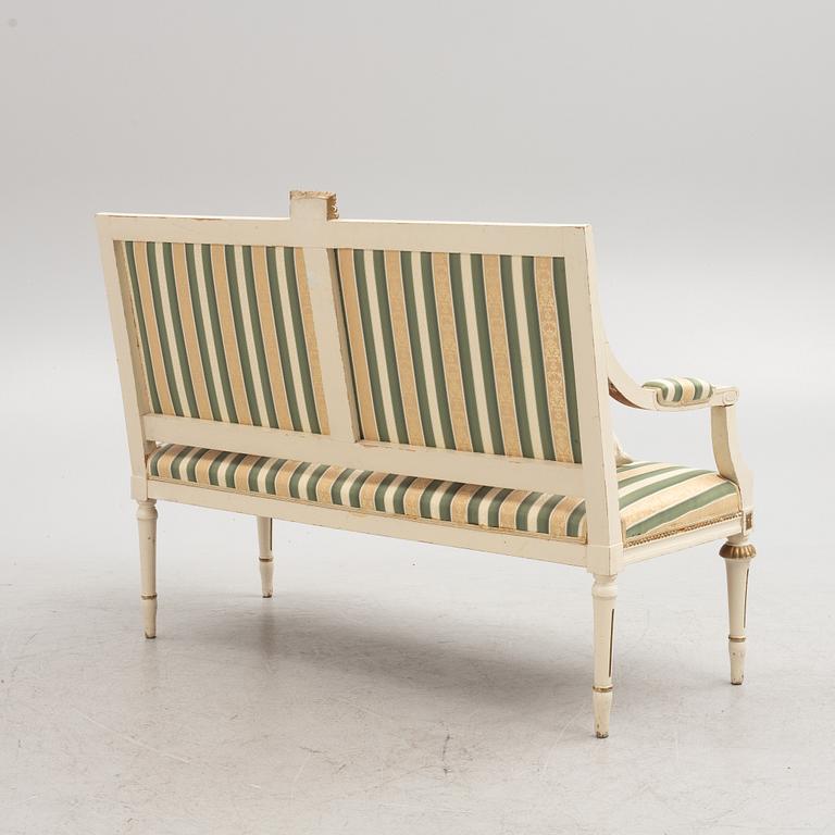 A Gustavian style sofa, early 20th century.