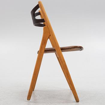 Hans J. Wegner, stol, modell "CH-29"/"Savbukkestolen", Carl Hansen & söner, 1900-talets mitt.