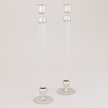 A pair of candlesticks "Plexi" by Josef Frank and Estrid Ericson in pewter and plexi glass from 2018.