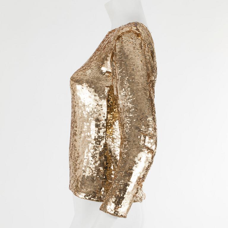 YVES SAINT LAURENT, a golden tinsel eveningjacket, size small.