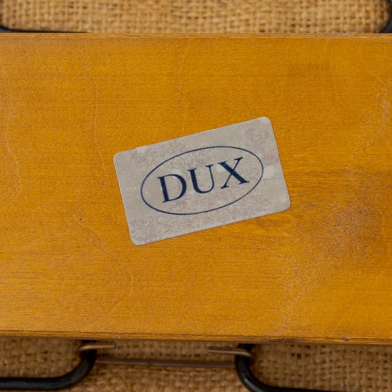 Folke Ohlson, two 'Siesta' armchairs, DUX, 1950s/60s.