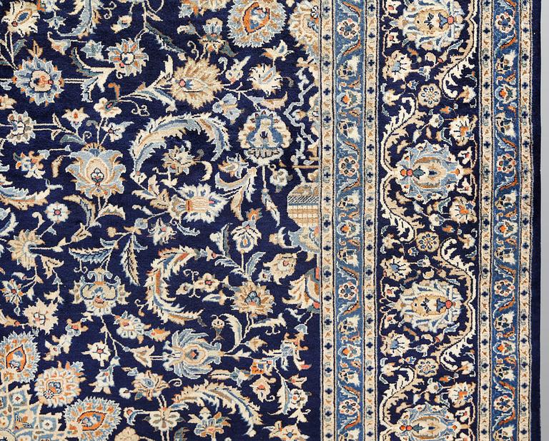A Kashmar carpet, ca 340 x 253 cm.