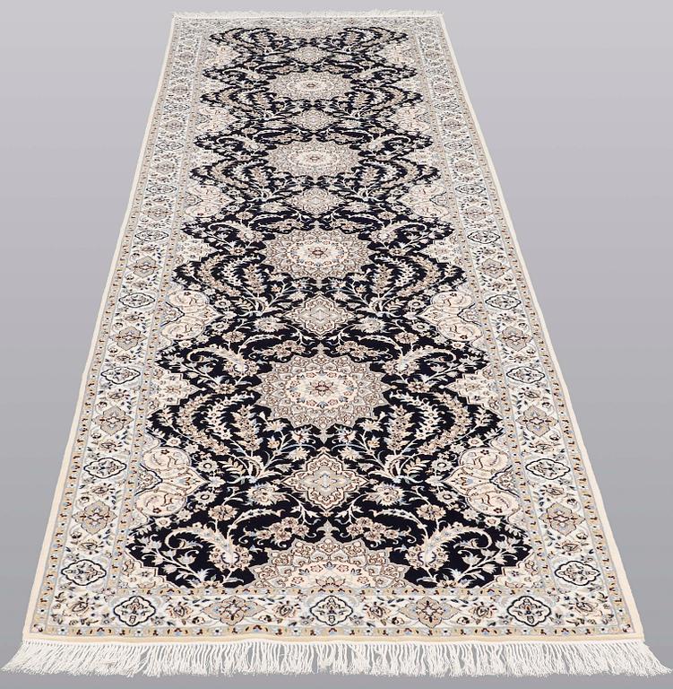 A Nain runner carpet, part silk Sk 6LAA, 337 x 103 cm.