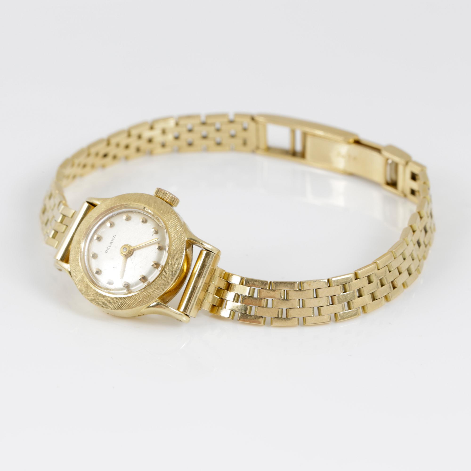 DAMUR, Delano, boett samt länk i 18K guld. Totalvikt ca 23 gram.