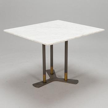 A marble top table, 21th century.