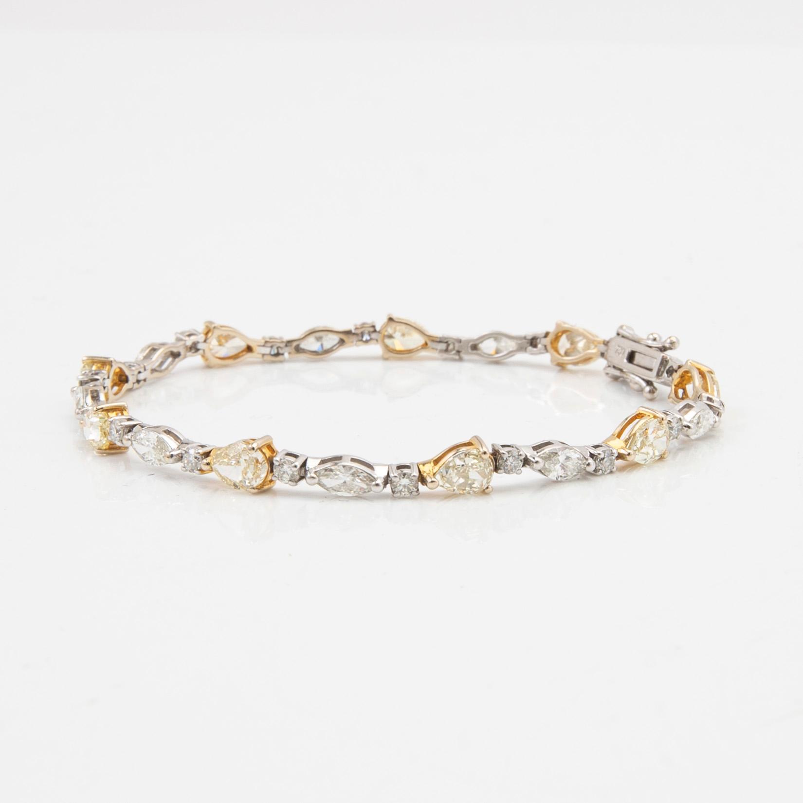 Armband, 18 k guld och vitguld med briljanter.